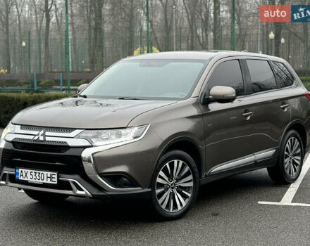 Коричневый Мицубиси Аутлендер, объемом двигателя 2 л и пробегом 154 тыс. км за 14999 $, фото 2 на Automoto.ua