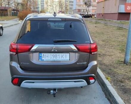 Коричневый Мицубиси Аутлендер, объемом двигателя 2 л и пробегом 175 тыс. км за 17900 $, фото 2 на Automoto.ua