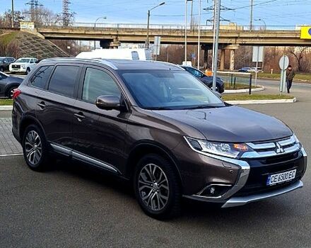 Коричневий Міцубісі Аутлендер, об'ємом двигуна 2.4 л та пробігом 129 тис. км за 20499 $, фото 2 на Automoto.ua