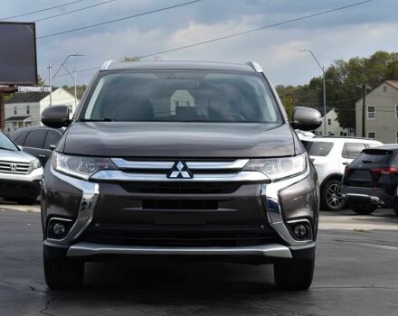 Коричневый Мицубиси Аутлендер, объемом двигателя 2.4 л и пробегом 43 тыс. км за 9650 $, фото 1 на Automoto.ua