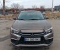 Коричневий Міцубісі Аутлендер, об'ємом двигуна 2 л та пробігом 84 тис. км за 12000 $, фото 1 на Automoto.ua