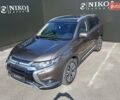 Коричневый Мицубиси Аутлендер, объемом двигателя 2.36 л и пробегом 106 тыс. км за 19500 $, фото 2 на Automoto.ua