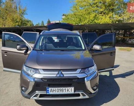 Коричневый Мицубиси Аутлендер, объемом двигателя 2 л и пробегом 175 тыс. км за 18900 $, фото 2 на Automoto.ua