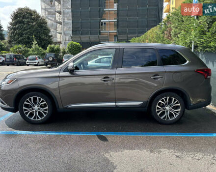 Коричневый Мицубиси Аутлендер, объемом двигателя 2.36 л и пробегом 185 тыс. км за 17670 $, фото 2 на Automoto.ua