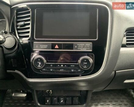 Коричневий Міцубісі Аутлендер, об'ємом двигуна 2 л та пробігом 125 тис. км за 18700 $, фото 93 на Automoto.ua