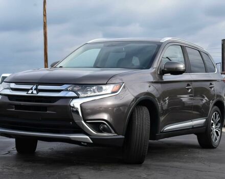 Коричневый Мицубиси Аутлендер, объемом двигателя 2.4 л и пробегом 43 тыс. км за 9650 $, фото 2 на Automoto.ua