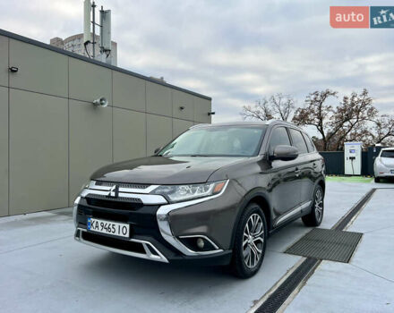 Коричневый Мицубиси Аутлендер, объемом двигателя 2.4 л и пробегом 192 тыс. км за 19500 $, фото 5 на Automoto.ua