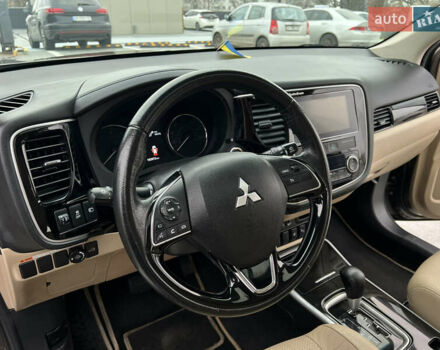 Коричневый Мицубиси Аутлендер, объемом двигателя 2.4 л и пробегом 192 тыс. км за 19500 $, фото 14 на Automoto.ua