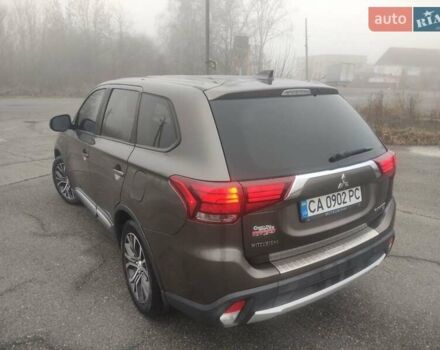 Коричневый Мицубиси Аутлендер, объемом двигателя 2.4 л и пробегом 117 тыс. км за 16500 $, фото 2 на Automoto.ua