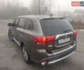 Коричневый Мицубиси Аутлендер, объемом двигателя 2.4 л и пробегом 117 тыс. км за 16500 $, фото 2 на Automoto.ua