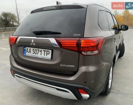 Коричневий Міцубісі Аутлендер, об'ємом двигуна 2 л та пробігом 125 тис. км за 18700 $, фото 53 на Automoto.ua
