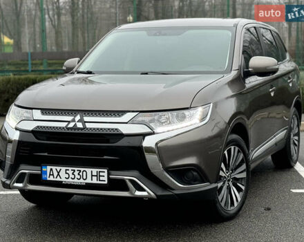 Коричневый Мицубиси Аутлендер, объемом двигателя 2 л и пробегом 154 тыс. км за 14999 $, фото 1 на Automoto.ua