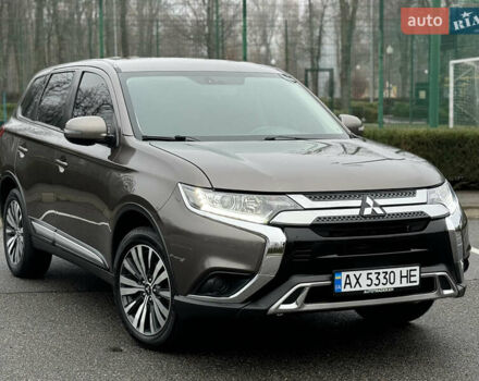 Коричневый Мицубиси Аутлендер, объемом двигателя 2 л и пробегом 154 тыс. км за 14999 $, фото 3 на Automoto.ua