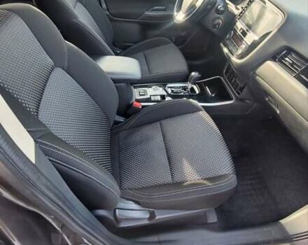 Коричневый Мицубиси Аутлендер, объемом двигателя 2 л и пробегом 125 тыс. км за 15500 $, фото 1 на Automoto.ua