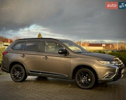 Коричневый Мицубиси Аутлендер, объемом двигателя 2.36 л и пробегом 58 тыс. км за 19500 $, фото 3 на Automoto.ua