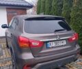 Коричневий Міцубісі Аутлендер, об'ємом двигуна 2 л та пробігом 84 тис. км за 12000 $, фото 5 на Automoto.ua