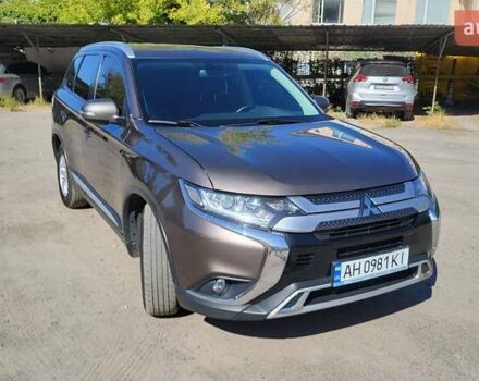Коричневый Мицубиси Аутлендер, объемом двигателя 2 л и пробегом 175 тыс. км за 18900 $, фото 1 на Automoto.ua