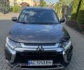Коричневий Міцубісі Аутлендер, об'ємом двигуна 2 л та пробігом 105 тис. км за 19500 $, фото 1 на Automoto.ua