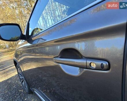 Коричневый Мицубиси Аутлендер, объемом двигателя 2.36 л и пробегом 69 тыс. км за 19700 $, фото 6 на Automoto.ua