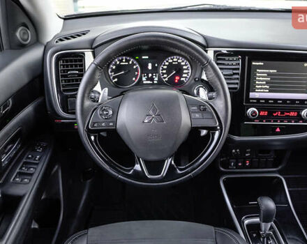 Коричневий Міцубісі Аутлендер, об'ємом двигуна 2.36 л та пробігом 80 тис. км за 24320 $, фото 9 на Automoto.ua