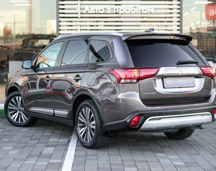 Коричневий Міцубісі Аутлендер, об'ємом двигуна 2.36 л та пробігом 80 тис. км за 24320 $, фото 1 на Automoto.ua