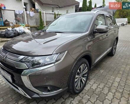 Коричневий Міцубісі Аутлендер, об'ємом двигуна 2.36 л та пробігом 80 тис. км за 27200 $, фото 2 на Automoto.ua
