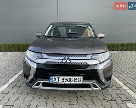 Коричневый Мицубиси Аутлендер, объемом двигателя 2 л и пробегом 65 тыс. км за 19500 $, фото 1 на Automoto.ua