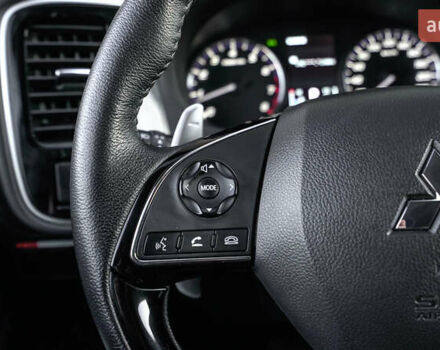 Коричневий Міцубісі Аутлендер, об'ємом двигуна 2.36 л та пробігом 80 тис. км за 24320 $, фото 18 на Automoto.ua