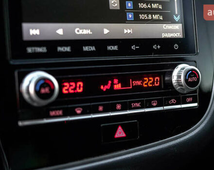 Коричневий Міцубісі Аутлендер, об'ємом двигуна 2.36 л та пробігом 80 тис. км за 24320 $, фото 28 на Automoto.ua