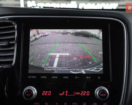 Коричневий Міцубісі Аутлендер, об'ємом двигуна 2.36 л та пробігом 80 тис. км за 24320 $, фото 26 на Automoto.ua