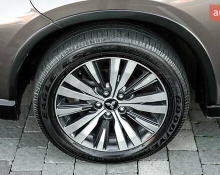 Коричневий Міцубісі Аутлендер, об'ємом двигуна 2.36 л та пробігом 80 тис. км за 24320 $, фото 12 на Automoto.ua