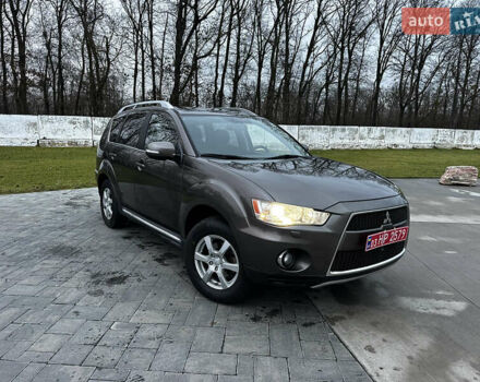 Коричневий Міцубісі Аутлендер, об'ємом двигуна 2.2 л та пробігом 235 тис. км за 10500 $, фото 1 на Automoto.ua