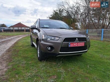 Коричневый Мицубиси Аутлендер, объемом двигателя 2 л и пробегом 207 тыс. км за 10950 $, фото 1 на Automoto.ua