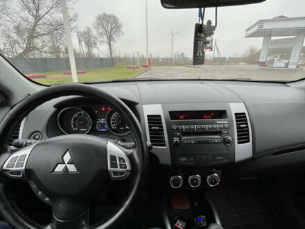 Коричневый Мицубиси Аутлендер, объемом двигателя 1.97 л и пробегом 268 тыс. км за 11300 $, фото 1 на Automoto.ua