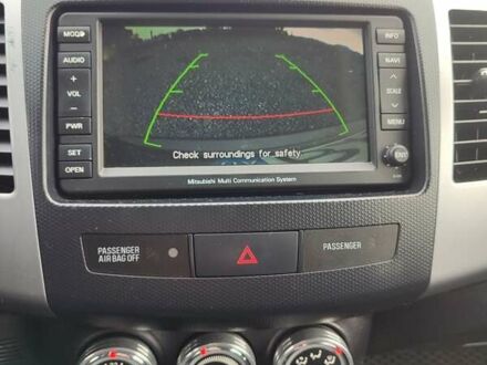 Коричневий Міцубісі Аутлендер, об'ємом двигуна 2.27 л та пробігом 149 тис. км за 12800 $, фото 1 на Automoto.ua