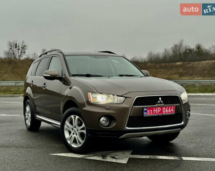 Коричневий Міцубісі Аутлендер, об'ємом двигуна 2.2 л та пробігом 197 тис. км за 11750 $, фото 1 на Automoto.ua