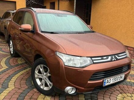Коричневый Мицубиси Аутлендер, объемом двигателя 2.3 л и пробегом 317 тыс. км за 13000 $, фото 1 на Automoto.ua