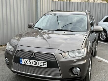 Коричневый Мицубиси Аутлендер, объемом двигателя 2.4 л и пробегом 191 тыс. км за 10900 $, фото 1 на Automoto.ua