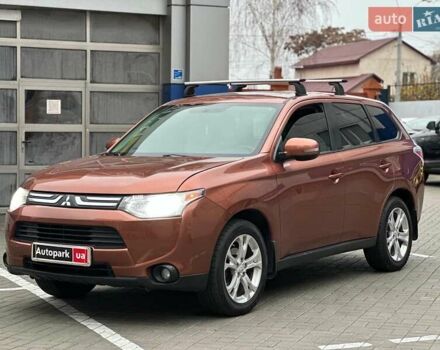Коричневий Міцубісі Аутлендер, об'ємом двигуна 2.4 л та пробігом 267 тис. км за 11990 $, фото 1 на Automoto.ua