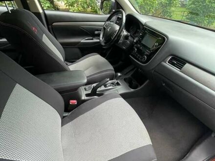 Коричневый Мицубиси Аутлендер, объемом двигателя 2.4 л и пробегом 126 тыс. км за 11500 $, фото 1 на Automoto.ua