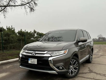 Коричневий Міцубісі Аутлендер, об'ємом двигуна 2.36 л та пробігом 197 тис. км за 14000 $, фото 1 на Automoto.ua