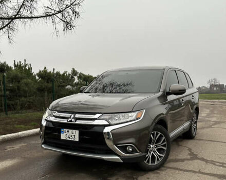Коричневый Мицубиси Аутлендер, объемом двигателя 2.36 л и пробегом 197 тыс. км за 14000 $, фото 1 на Automoto.ua
