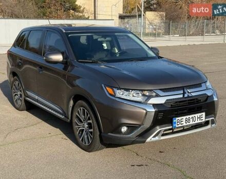 Коричневый Мицубиси Аутлендер, объемом двигателя 2.36 л и пробегом 128 тыс. км за 15500 $, фото 1 на Automoto.ua