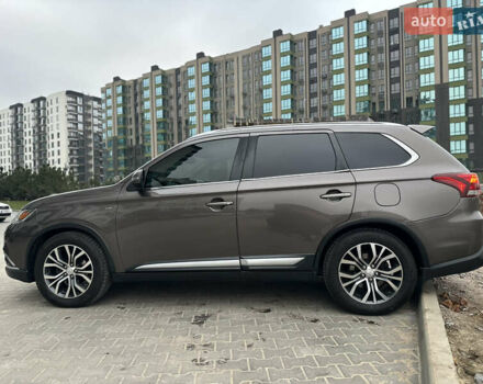 Коричневый Мицубиси Аутлендер, объемом двигателя 3 л и пробегом 164 тыс. км за 14800 $, фото 1 на Automoto.ua