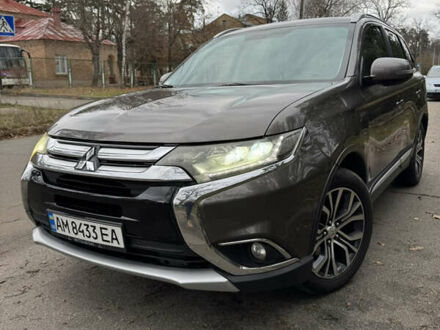 Коричневий Міцубісі Аутлендер, об'ємом двигуна 2.36 л та пробігом 167 тис. км за 12500 $, фото 1 на Automoto.ua