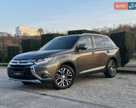 Коричневый Мицубиси Аутлендер, объемом двигателя 2.36 л и пробегом 115 тыс. км за 15500 $, фото 1 на Automoto.ua