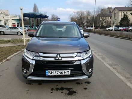 Коричневий Міцубісі Аутлендер, об'ємом двигуна 2.36 л та пробігом 84 тис. км за 17500 $, фото 1 на Automoto.ua