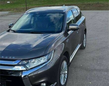 Коричневый Мицубиси Аутлендер, объемом двигателя 2 л и пробегом 160 тыс. км за 13699 $, фото 1 на Automoto.ua