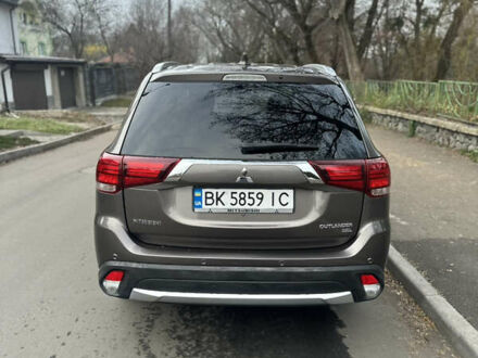 Коричневий Міцубісі Аутлендер, об'ємом двигуна 2.36 л та пробігом 48 тис. км за 18000 $, фото 1 на Automoto.ua