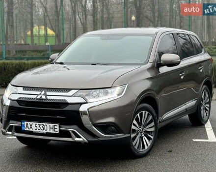 Коричневый Мицубиси Аутлендер, объемом двигателя 2 л и пробегом 154 тыс. км за 14999 $, фото 1 на Automoto.ua
